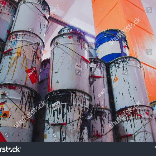 stock-photo-a-collection-of-paint-cans-glue-buckets-mastic-and-toxic-and-hazardous-material-stacked-1537707947