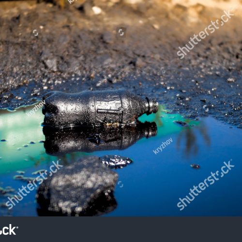 stock-photo-closeup-photo-of-soil-polluted-with-plastic-gardage-and-oil-waste-concept-of-harm-to-environment-1734366536