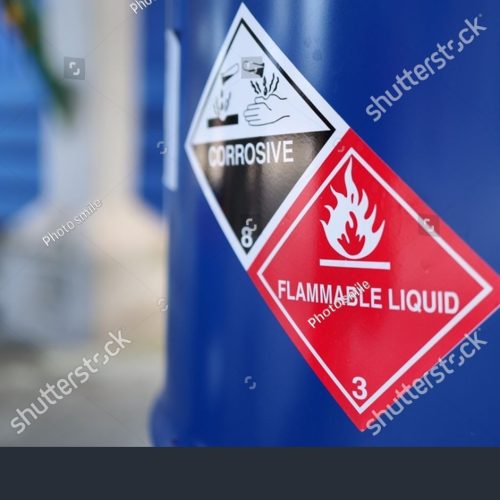 stock-photo-corrosive-warning-sign-label-and-flammable-liquid-warning-sign-label-on-the-barrel-tank-to-warn-2507927949