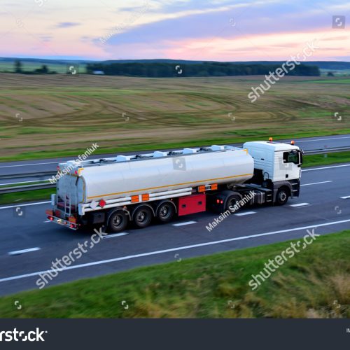 stock-photo-isothermal-tank-truck-driving-on-highway-oil-and-gas-transportation-and-logistics-metal-chrome-1814479946